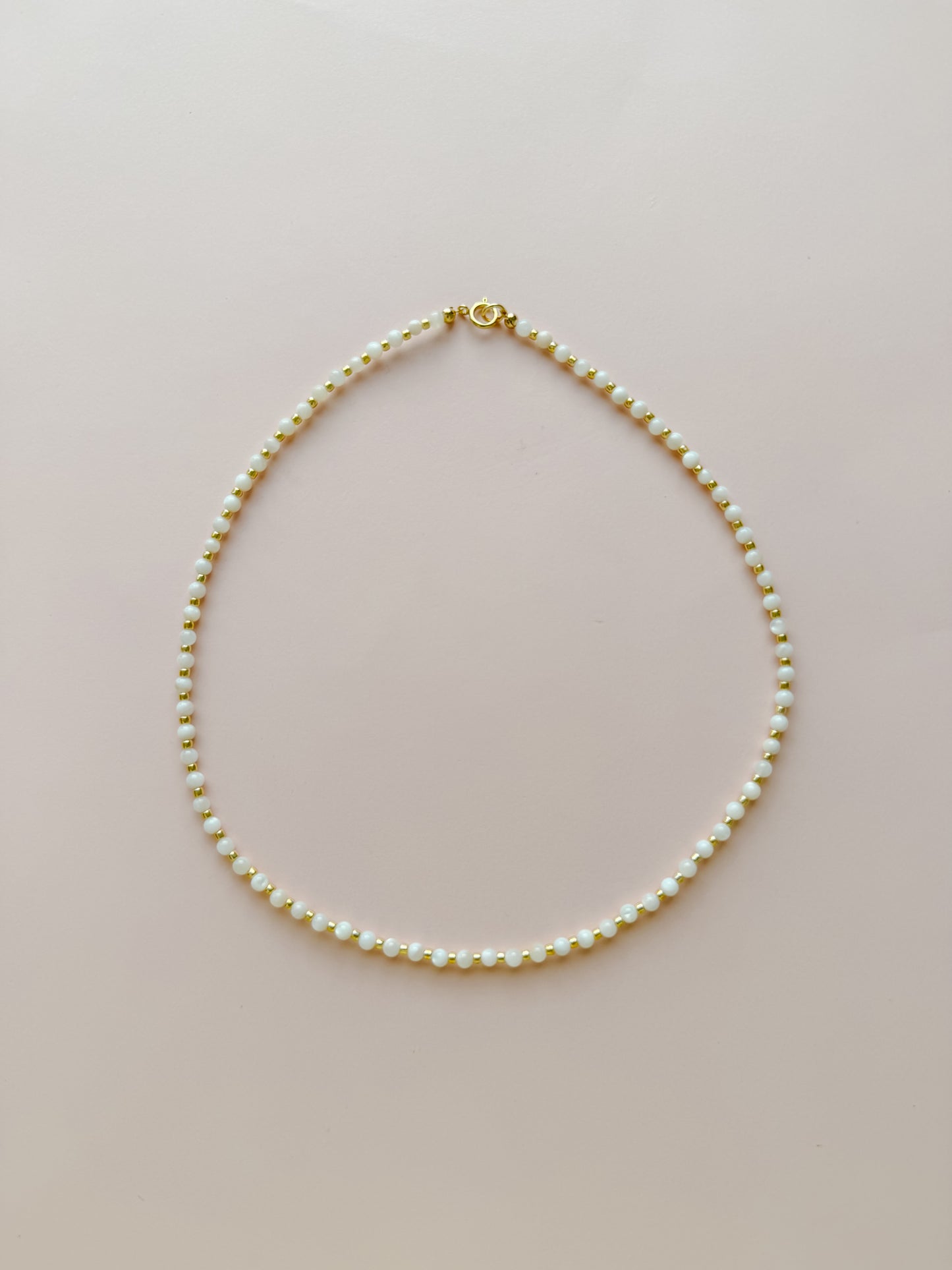 Mother of Pearl Ball with Gold Necklace
