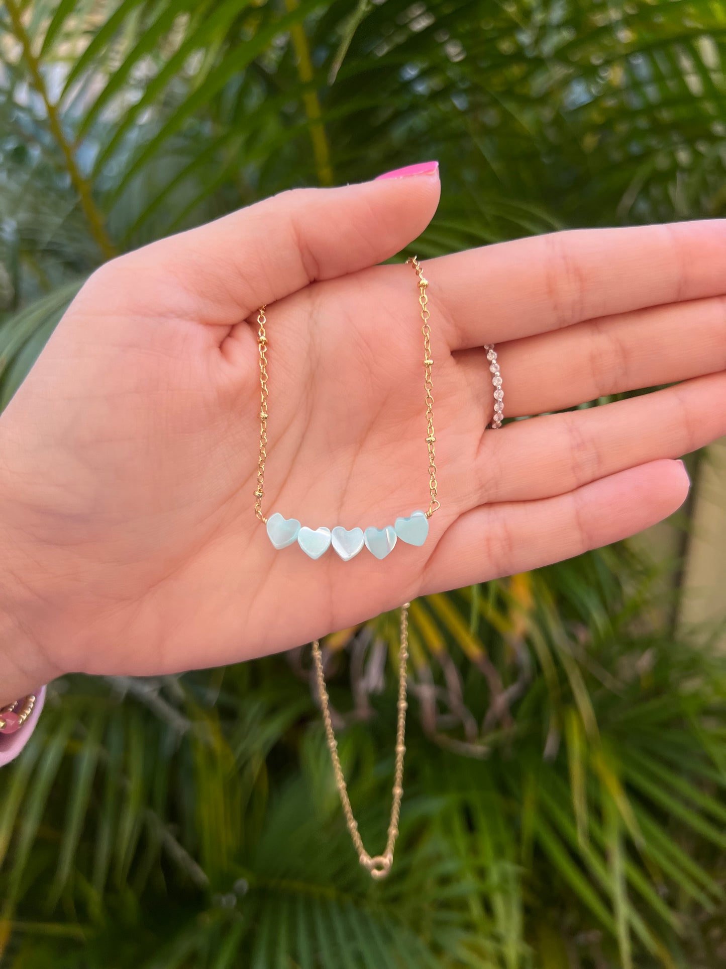 Light Blue Shell Hearts Necklace