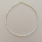 Mother of Pearl Cylinder with Gold Necklace