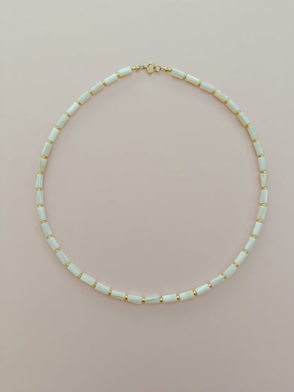 Mother of Pearl Cylinder with Gold Necklace