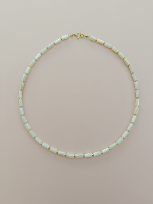 Mother of Pearl Cylinder with Gold Necklace