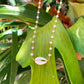 Horizontal Cowrie Shell Necklace on Beaded Chain